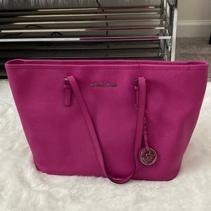 Michael Kors Tote,pockets inside, silver hardware, fuchsia, excellent condition